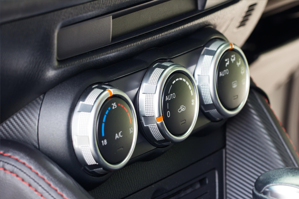 close-up view of a ac dials in a vehicle 